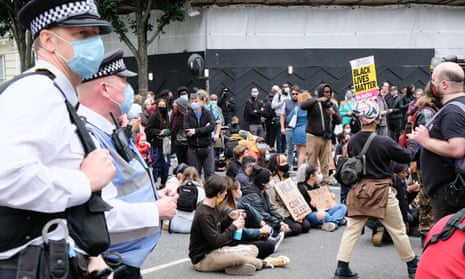 Black Lives Matter protesters stop traffic in Notting Hill Gate in August 2020. 