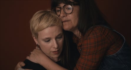 Clémentine Autain receives a hug from Romane Bohringer