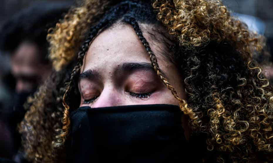 US-RACISM-POLICE-TRIAL-RIGHTS<br>A woman cries as the verdict is announced in the trial of former police officer Derek Chauvin outside the Hennepin County Government Center in Minneapolis, Minnesota on April 20, 2021. - Sacked police officer Derek Chauvin was convicted of murder and manslaughter on april 20 in the death of African-American George Floyd in a case that roiled the United States for almost a year, laying bare deep racial divisions. (Photo by CHANDAN KHANNA / AFP) (Photo by CHANDAN KHANNA/AFP via Getty Images)