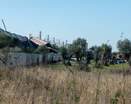 View from across a field of the train crash scene