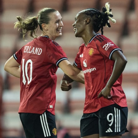 Elisabeth Terland (left) celebrates her hat-trick with Melvine Malard during Manchester United’s qualifying round victory over Brann.
