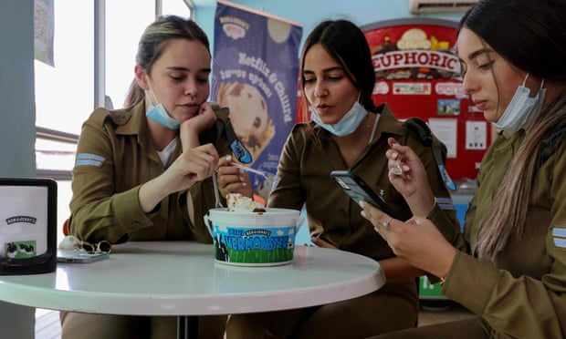 Israeli soldiers eat at the Ben &amp; Jerry’s factory in Be’er Tuvia on Wednesday.