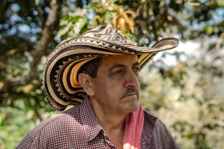 A man in a wide-birmmed sombrero style hat.
