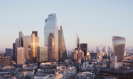 Elevated view over London City skyline at sunset