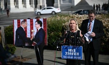 Marjorie Taylor Greene and Thomas Massie hold a press conference outside the US Capitol in Washington, DC.