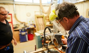 Staff in the woodwork room at Tarnbrook unit at Guild Lodge NHS secure mental health unit in Lancashire.