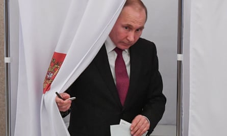 Vladimir Putin pulls aside a curtain as he leaves a polling station