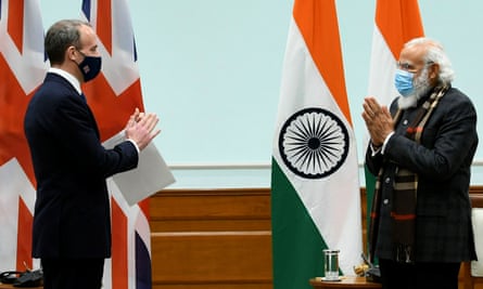 The Indian prime minister, Narendra Modi, receives the British foreign secretary, Dominic Raab, in New Delhi.