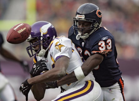 Charles Tillman knocking the ball out of the hands of Minnesota Vikings receiver Randy Moss in 2004.