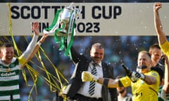 Ange Postecoglou, who has been linked with a Premier League move this summer, lifts the Scottish Cup.