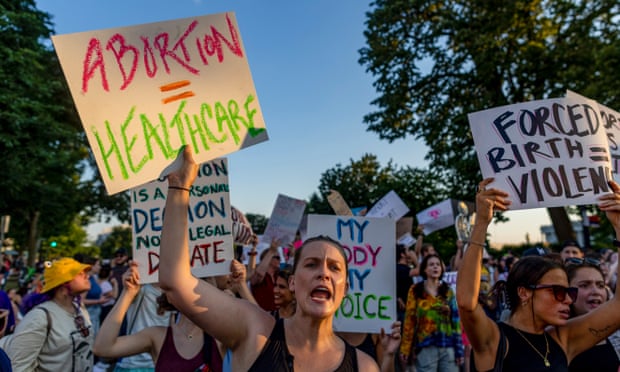 Protesters gather in the wake of the decision overturning Roe v Wade outside the US supreme court on 25 June 2022.