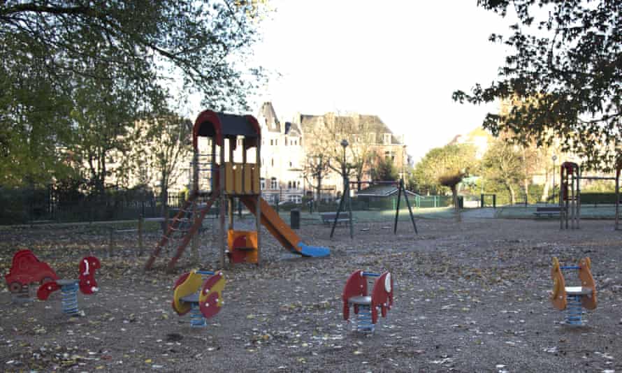 A children's playground and park are empty in the European Quarter of Brussels on Monday, Nov. 23, 2015. The Belgian capital Brussels has entered its third day of lockdown, with schools and underground transport shut and more than 1,000 security personnel deployed across the country. (AP Photo/Virginia Mayo)