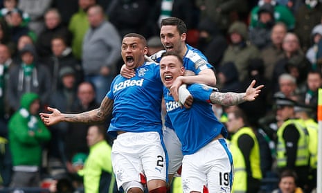 Rangers’ Barrie McKay, right, celebrates scoring his side’s second goal against Celtic
