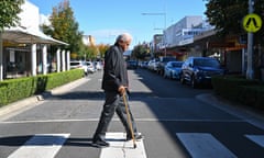 A pedestrian crosses the street in Penrith