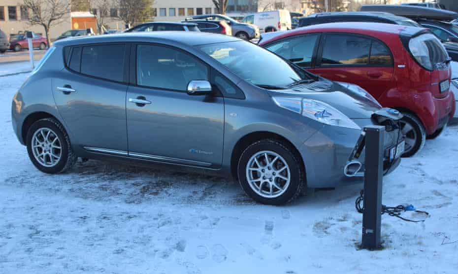 Electric cars charging in snow in Norway