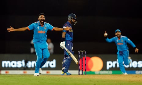 Mohammed Siraj celebrates after taking the lbw wicket of Sri Lanka's Dimuth Karunaratne