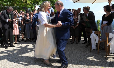  Karin Kneissl and Russian President Vladimir Putin dance at her wedding celebrations.