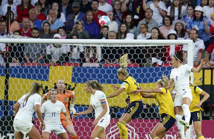 Lucy Bronze of England leads the ball.