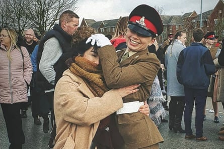 A undated handout picture released by the family of Jaysley Beck through the Centre for Military Justice in London on February 20, 2025, shows Jaysley Beck (R) at her passing out parade with her mother Leighann McCready (L).
