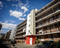 Chagford House, a brick apartment block in Tower Hamlets, stands under a blue sky