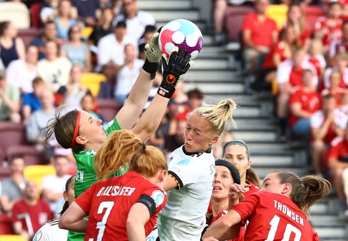 Denmark’s keeper Lene Christensen claims a corner.