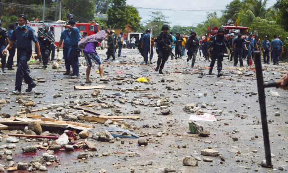 Rubble on the street after clashes in Kidapawan