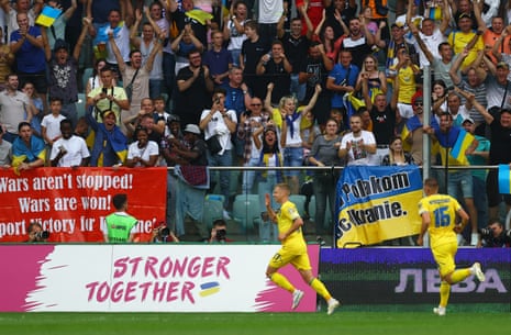Ukraine's Oleksandr Zinchenko celebrates after opening the scoring against England.