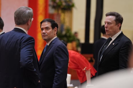 US secretary of state Marco Rubio and Elon Musk arrive prior to a state dinner at the Great Hall of the People in Beijing.