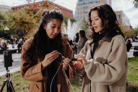 Drutman and her producer, Christa Guzmán, setting up a phone and mics.