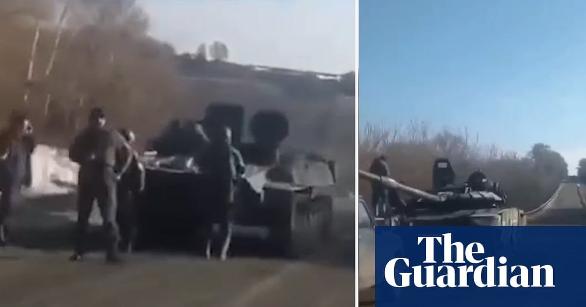 ‘Can I tow you back to Russia?’: Ukrainian confronts soldiers by broken armoured vehicle – video