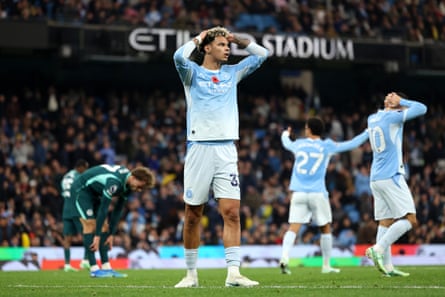 Nico O'Reilly of Manchester City reacts after missing a chance against Brighton.