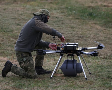 An operator prepares a military drone