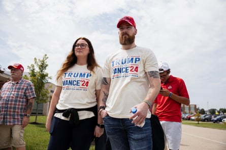 Supporters queue to get into Republican vice presidential nominee JD Vance’s rally at Middletown high school.