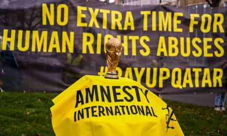 A protest by Amnesty International outside the Qatari embassy on International Migrants Day.
