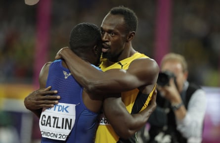 Usain Bolt embraces Gatlin after the men’s 100m final.