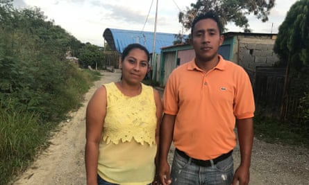 The parents of Victoria Martínez, Misael Martínez and Raquel Fuentes, outside their home in a shantytown in the Venezuelan city of Barquisimeto.