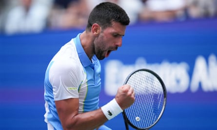 Novak Djokovic clenches his fist after winning a point