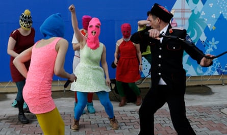 Maria Alyokhina, centre, and members of Pussy Riot are set upon by police in Sochi, 2014