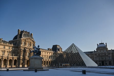 The Louvre building and glass pyramid.