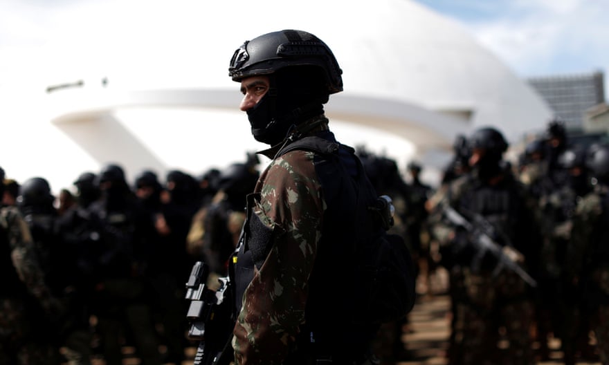 Brazilian soldiers carry out security preparations in Brasília before Tuesday’s inauguration of Jair Bolsonaro.
