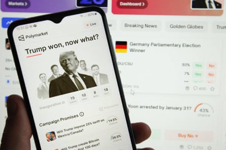 A phone shows a market for ‘Trump won, now what?’