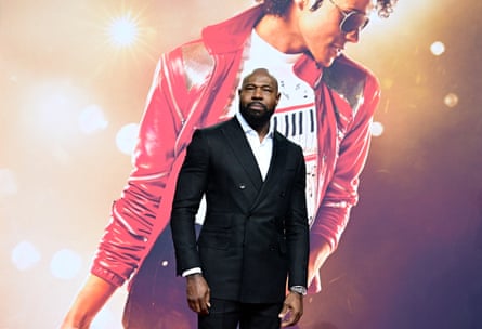 Director Antoine Fuqua poses for photographers as he arrives on the red carpet for the world premiere of the Michael Jackson biopic in Berlin
