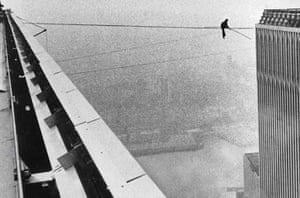 Petit is seen on the tightrope strung between what were then the second tallest buildings in the world.