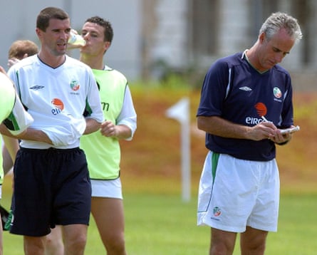 The Republic of Ireland captain Roy Keane (left) trains in Saipan in May 2002 while Mick McCarthy takes notes