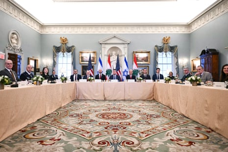 Officials sat at a table for talks.