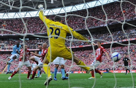 Manchester City’s Yaya Touré (left) scores.