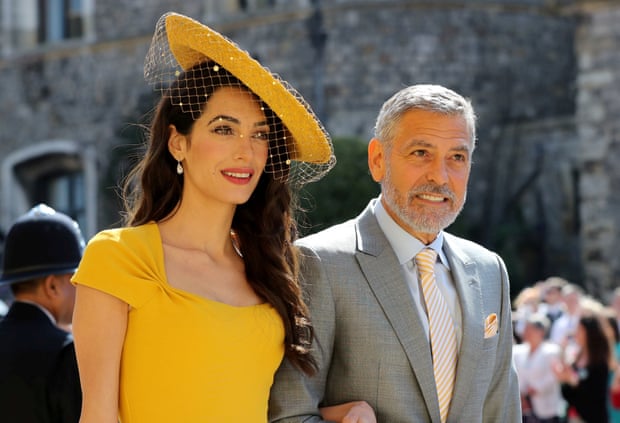 Amal and George Clooney arrive at St George’s Chapel, Windsor Castle, for the wedding of Meghan Markle and Prince Harry in May 2018.
