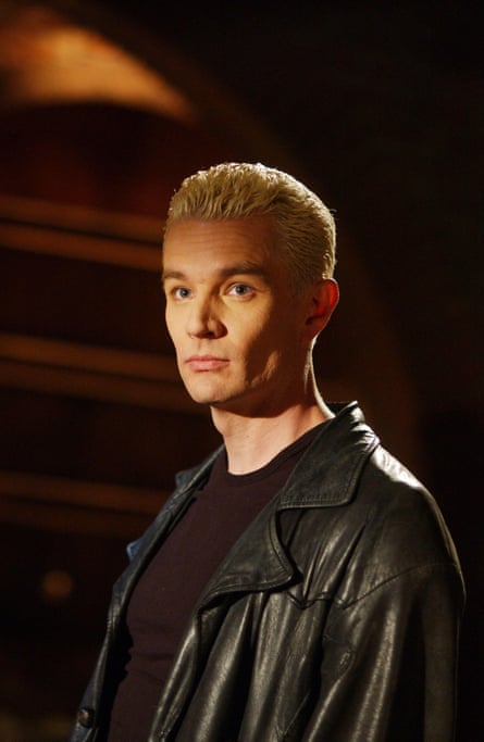 Man with bleached blond hair wearing leather jacket.