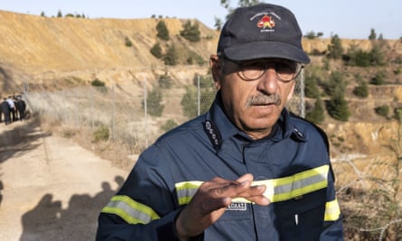 Cyprus fire chief, Marcos Trangolas, speaks at the Red Lake near the village of Mitsero.