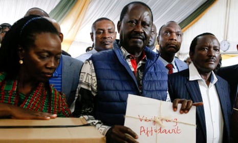 Raila Odinga (centre) files a petition in Nairobi challenging the presidential election result